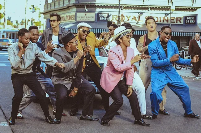 A still from "Uptown Funk" by Mark Ronson featuring Bruno Mars.