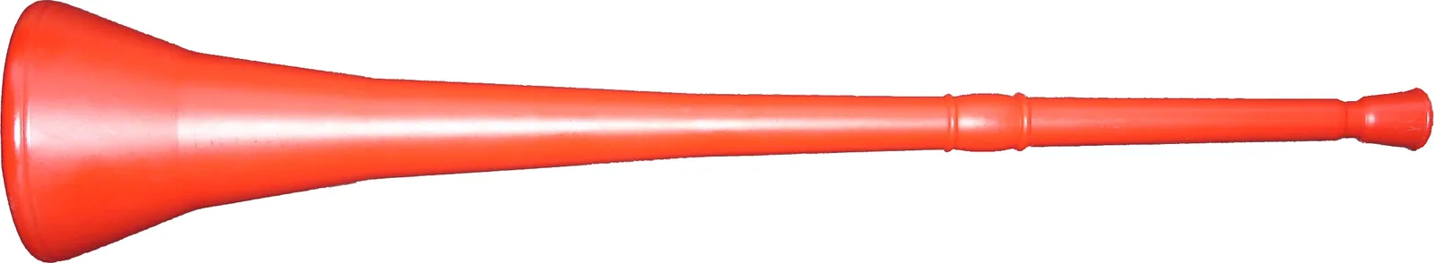 A red plastic vuvuzela on a white background.