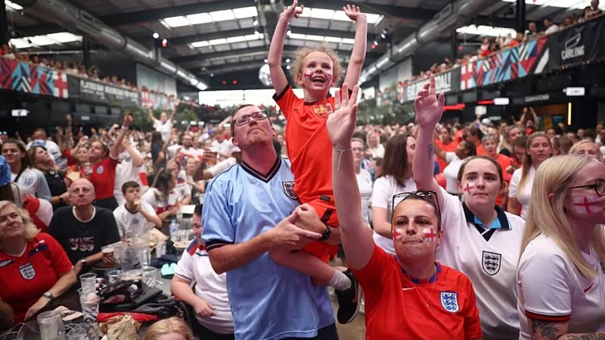 Red and white England fans gather in London for Women's Euro final
