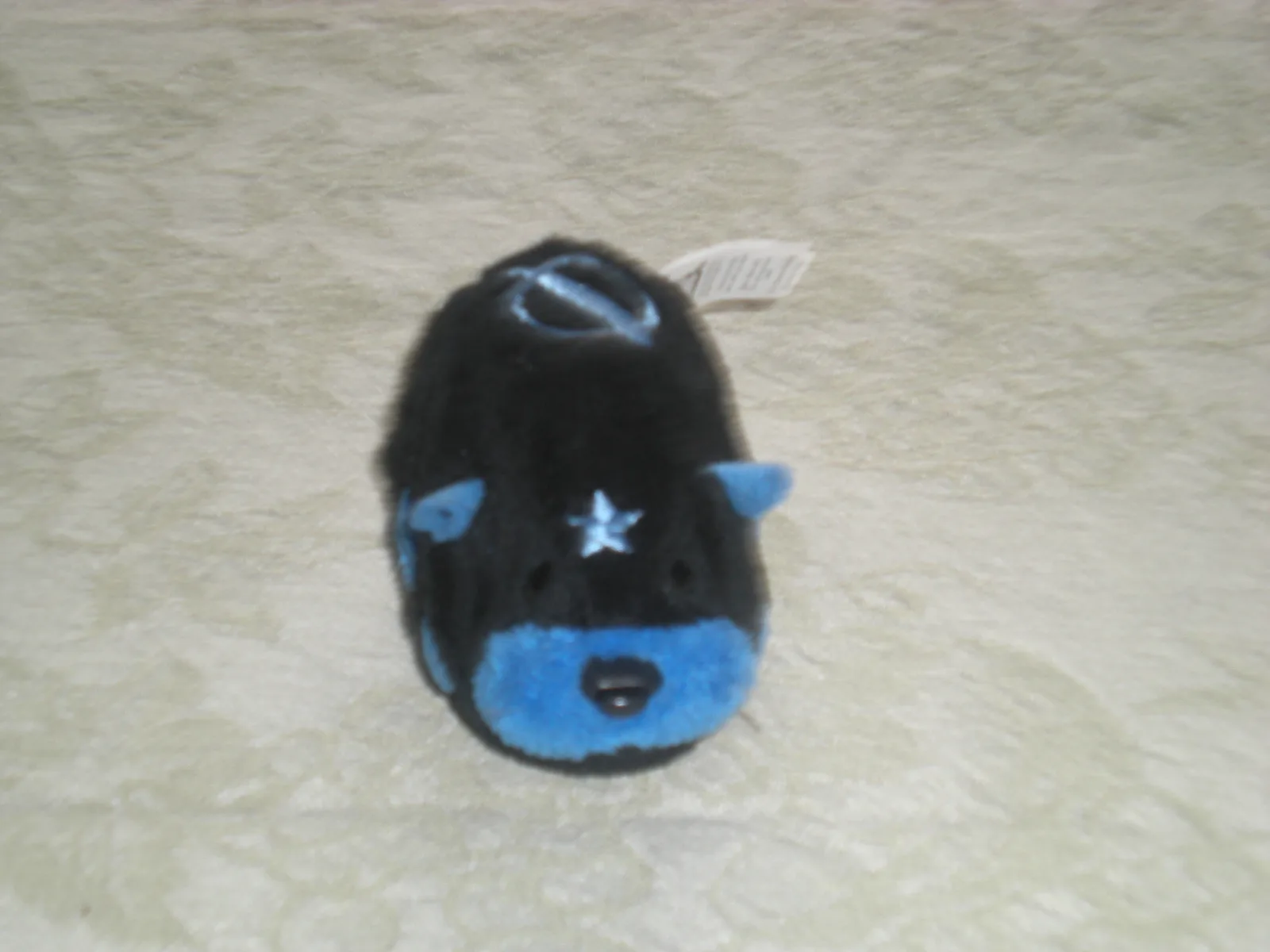 A black-and-blue Zhu Zhu hamster, 2011
